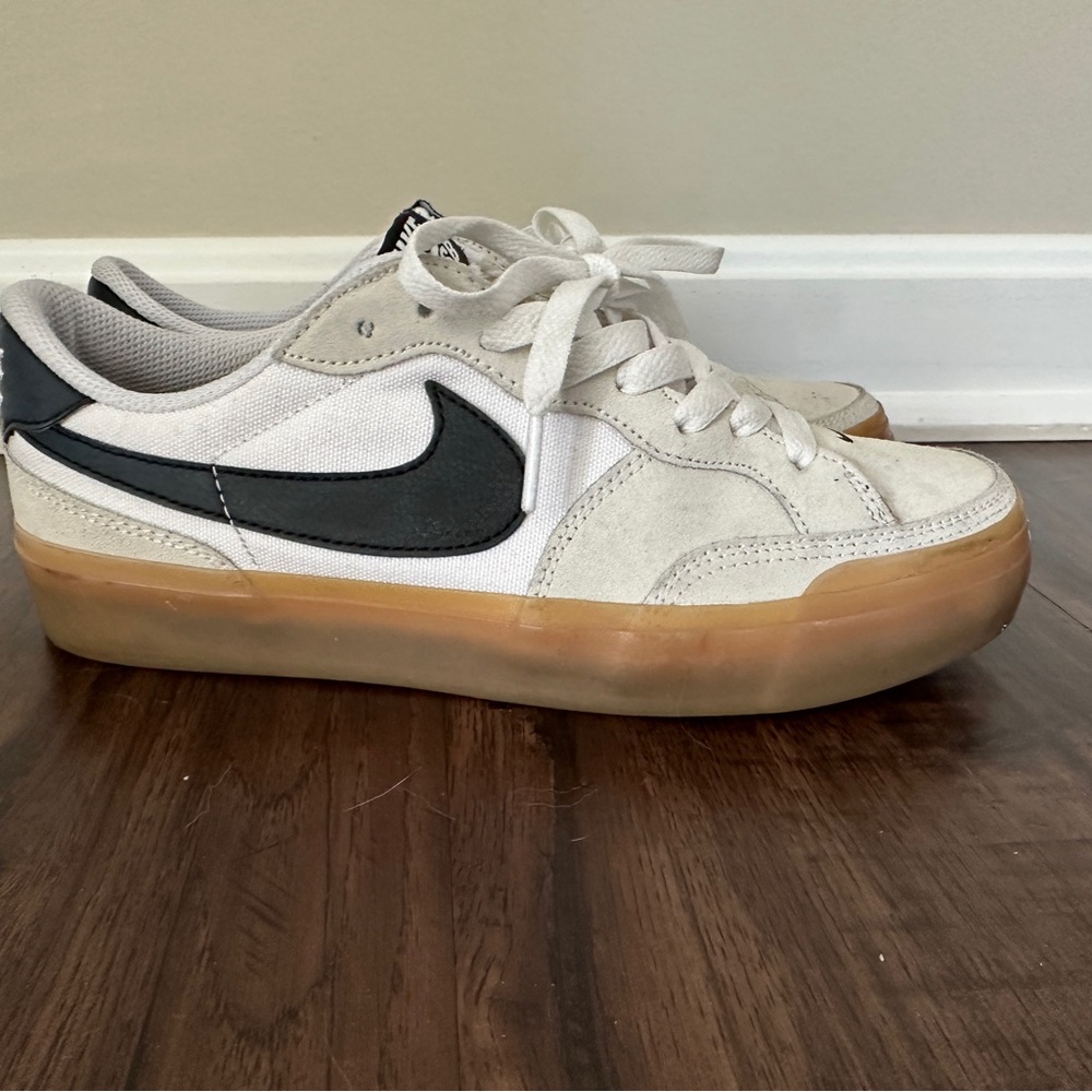 Nike Women's Sneakers in White and Black with Gum Sole